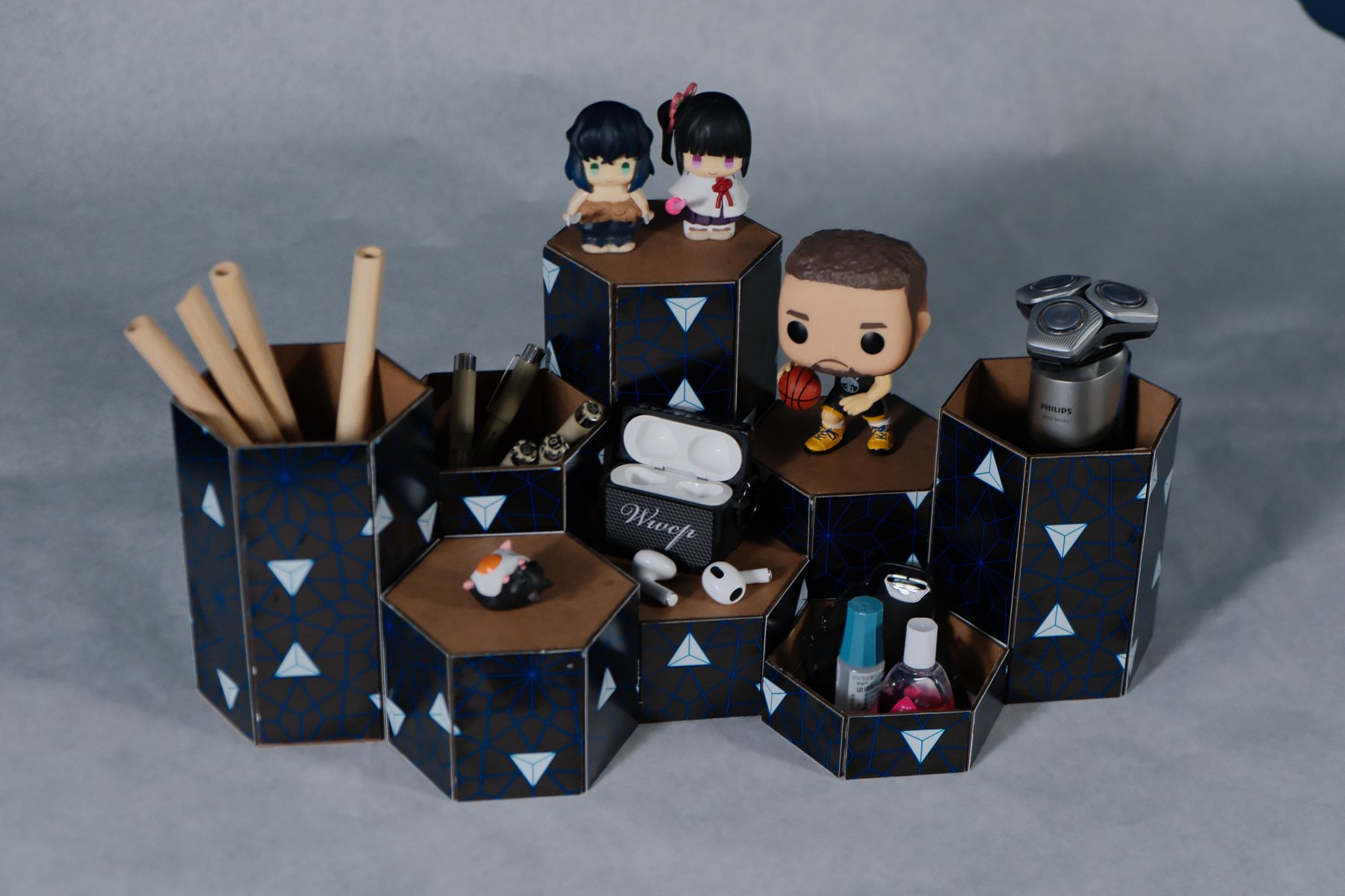 Honeycomb modular desk organizer assembled from hexagonal units