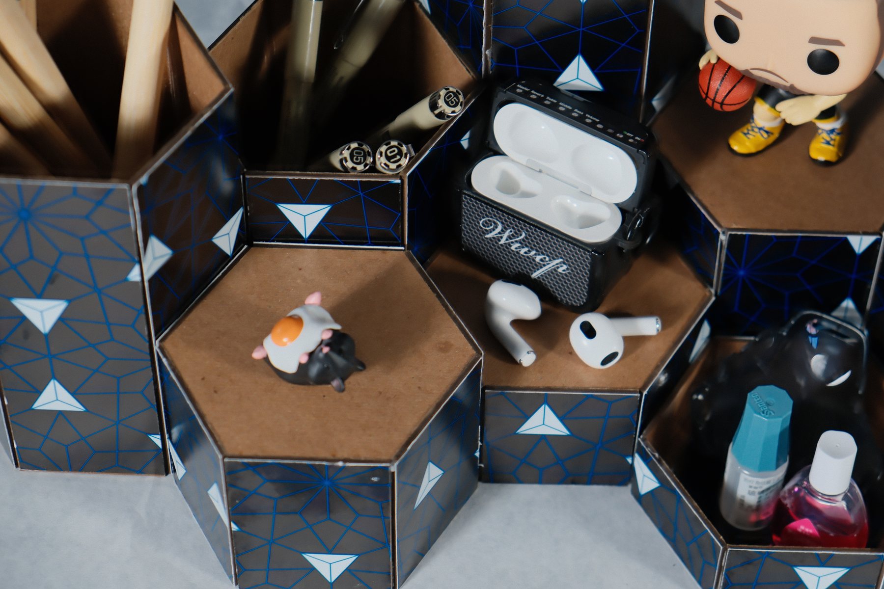 Close view of multiple honeycomb organizer modules meeting