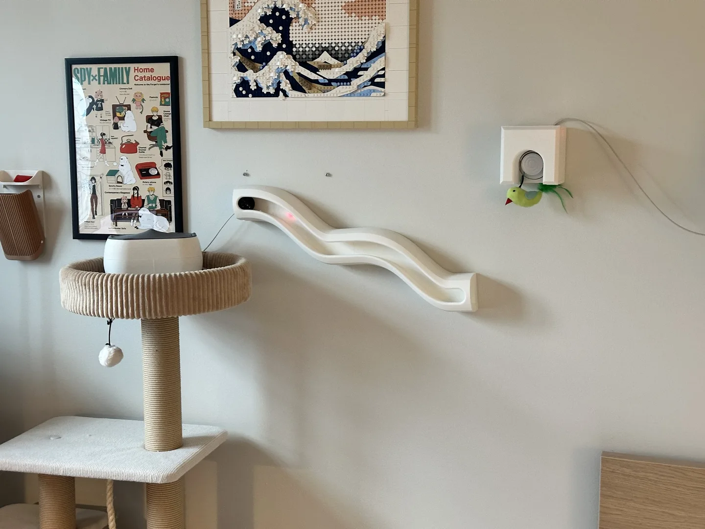 HUNT IoT cat enrichment system installed across an apartment wall and window zone
