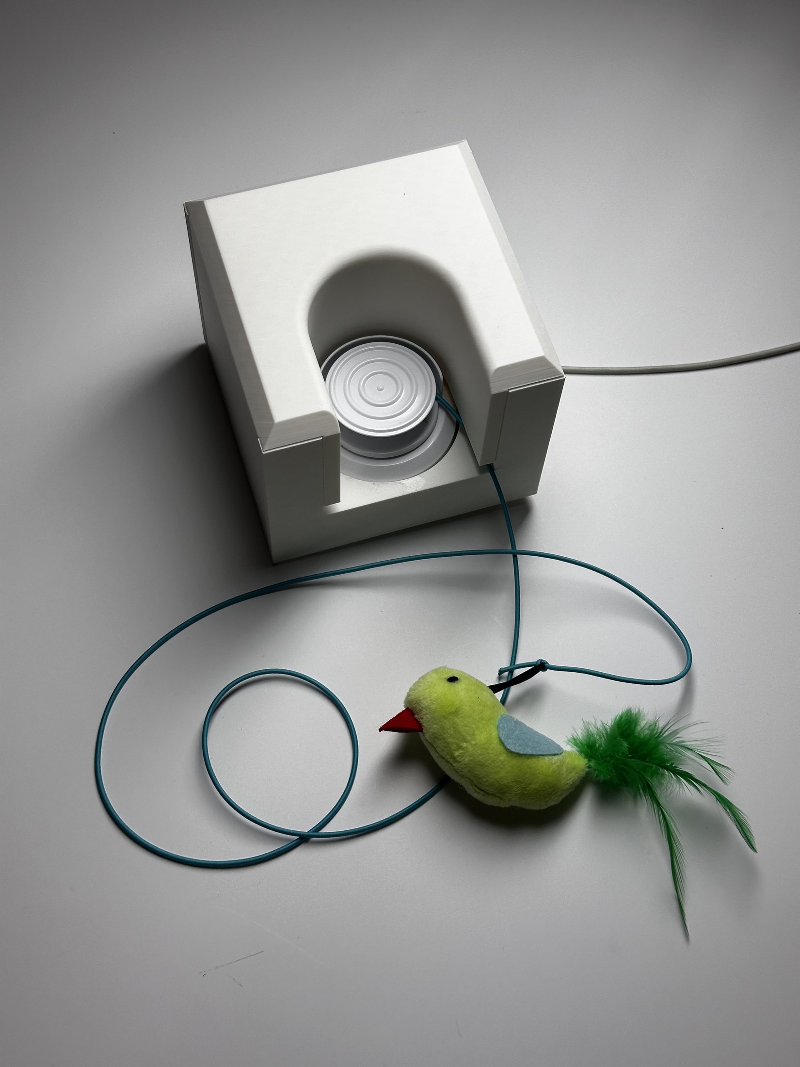 Physical CATCH prototype with soft bird toy