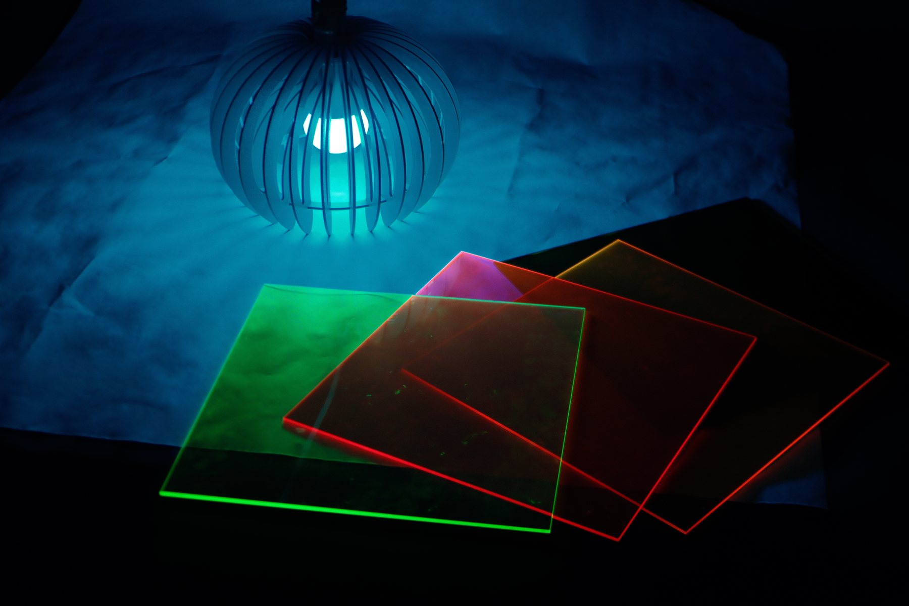 Separate material study showing the same colored acrylic under another lighting color